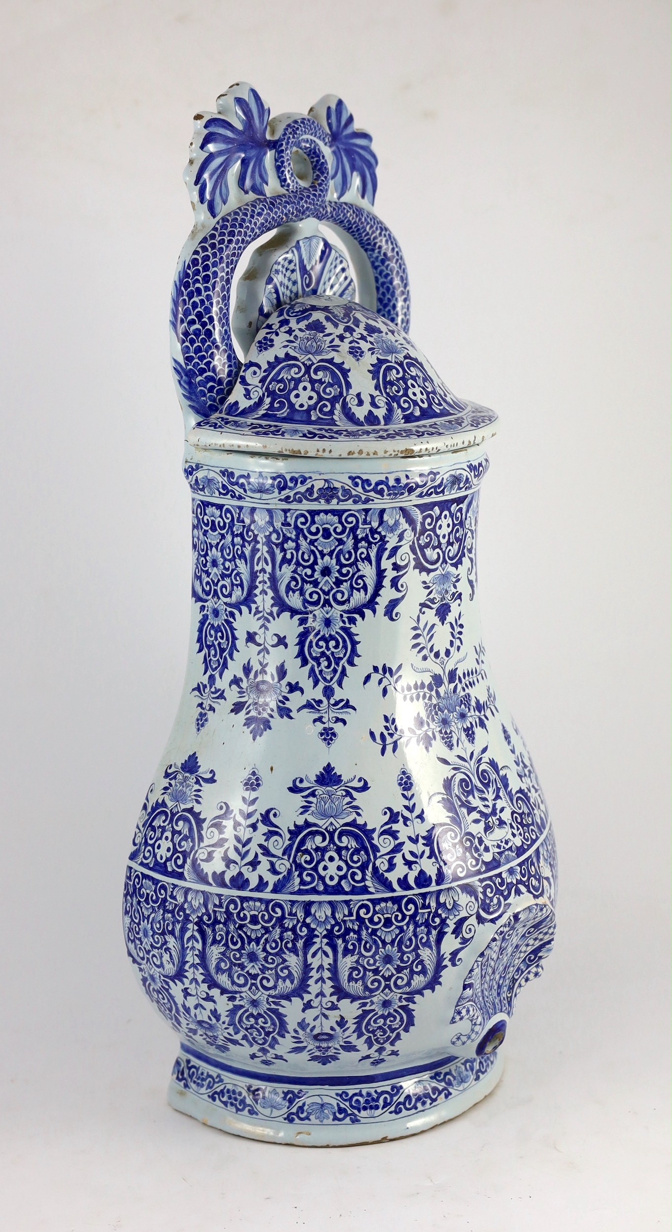 A large Rouen faience blue and white cistern, second quarter 18th century, 57.5cms high 57.5cm high, restorations